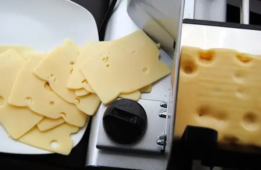 cheese in meat slicer
