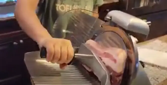 Slicing meat for hotpot