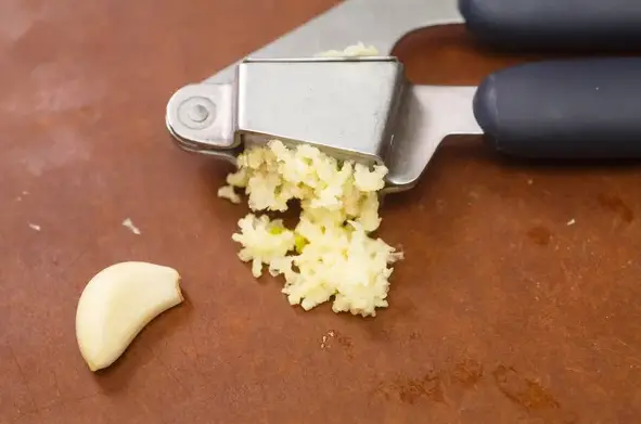A Garlic Press Slicer